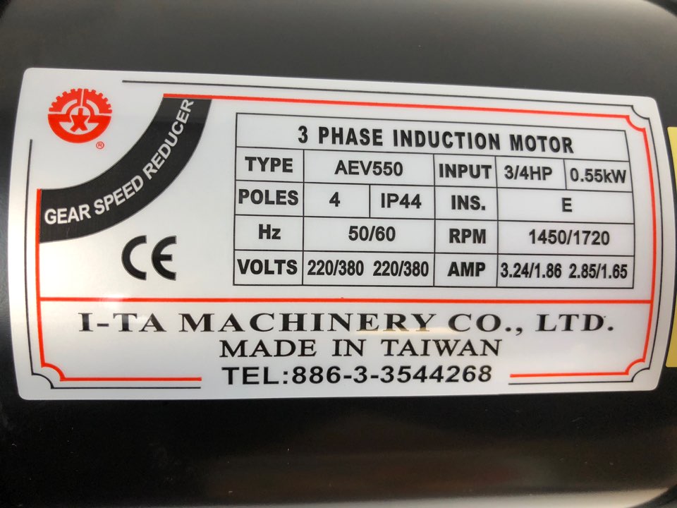 Close-up of the I-TA Machinery Co., Ltd. motor label detailing specifications and certifications