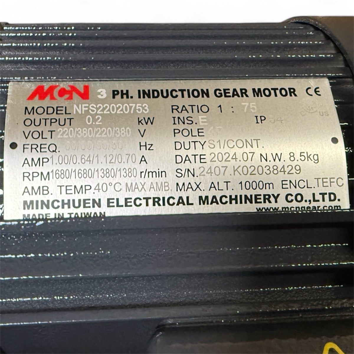 Close-up of the label on the NFS22020753R Induction Geared Motor by Minchuen Electrical Machinery Co., Ltd